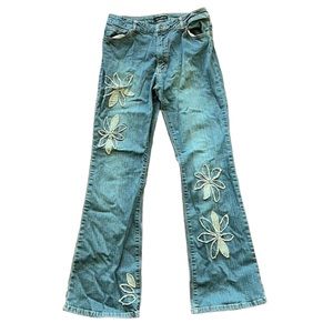 Distressed floral denim jeans
